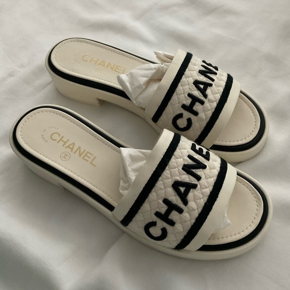 CHANEL Shoes - Chanel rev ivory/black mules sandals 38.5